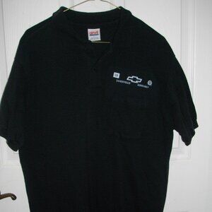 Men's General Motors Janesville Assembly black polo. L. New.